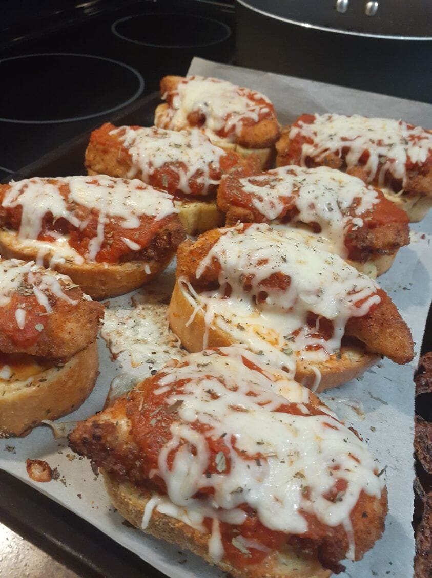 Chicken tenders on Texas toast with sauce and sherred mozzarella
